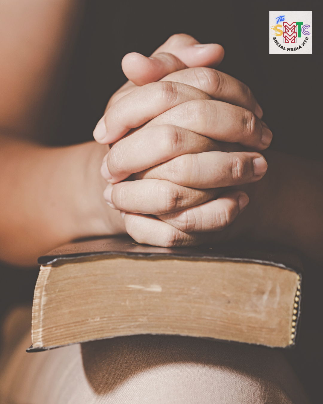 Folded hands in prayer over an open Bible, representing simple faith and personal testimony in Jesus Christ.